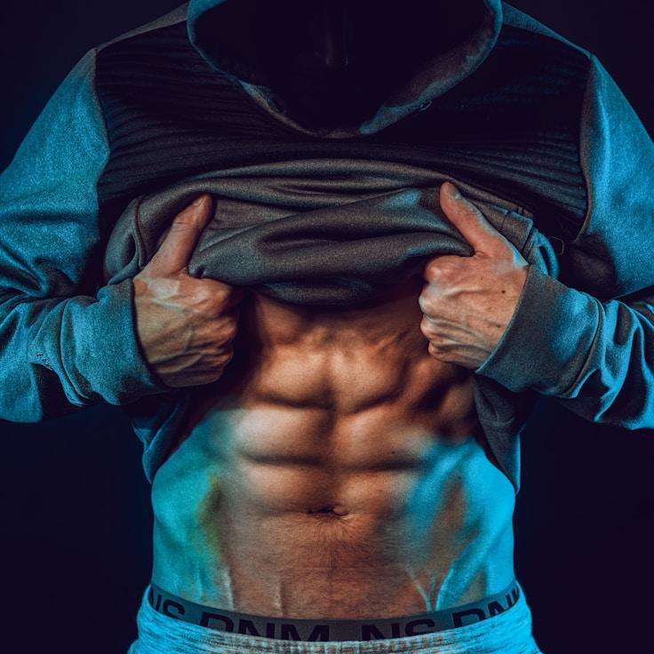 Interior of a professional gym with weight training equipment and mirrors